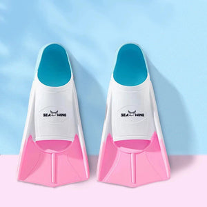 Swimming training with fins wrapped around the feet