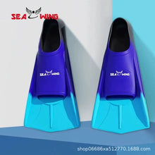 Load image into Gallery viewer, Swimming training with fins wrapped around the feet
