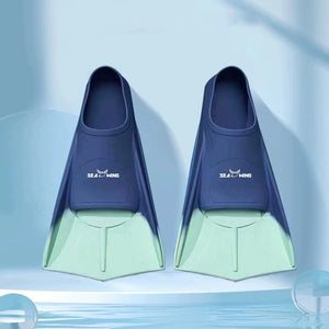 Swimming training with fins wrapped around the feet