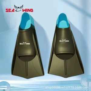 Swimming training with fins wrapped around the feet