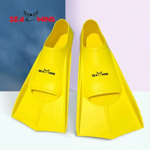 Swimming training with fins wrapped around the feet