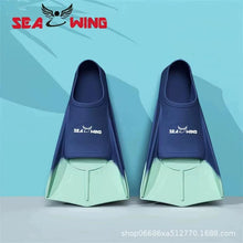 Load image into Gallery viewer, Swimming training with fins wrapped around the feet
